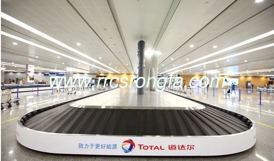 airport baggage carousel. inclined carousel. baggage reclaim carousel. baggage carousel .
