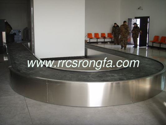 Baggage reclaim carousel. flat carousel. flat plate carousel. plane baggage carousel. horizaontal claim conveyor
