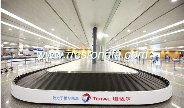 airport baggage carousel. inclined carousel. baggage reclaim carousel. baggage carousel .
