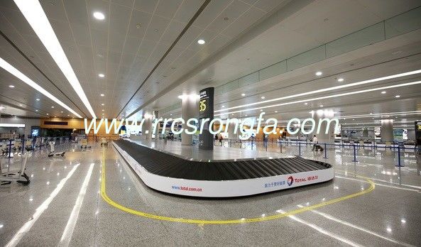 Baggage reclaim carousel. inclined rubber slat inclined claim conveyor. carousel slat